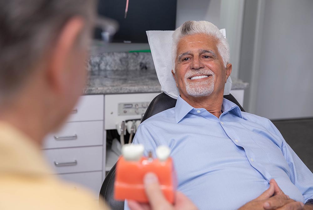 Happy patient at Crawford Implant Dentistry